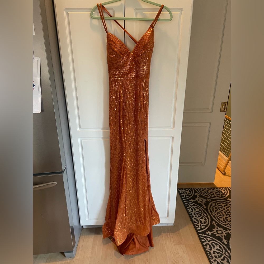 Beautiful burnt orange/rust sequin dress. Never worn.